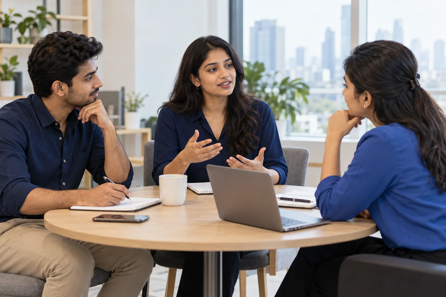 Indian professionals practising workplace communication and an interview together